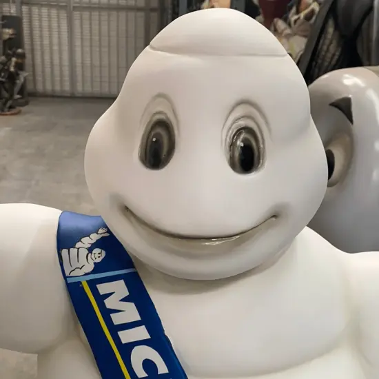 Tire Man Waving Small Statue {5}