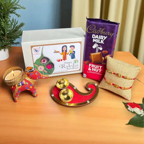 Rakhi Gift Hamper for Brother Bhabhi Raksha Bandhan Set of 2 Ganesha Bracelet Rakhis with Roli Chawal Rakhi Stickers Gift Box Bhaiya Sister In Law Traditional Rakhi Combo {1}