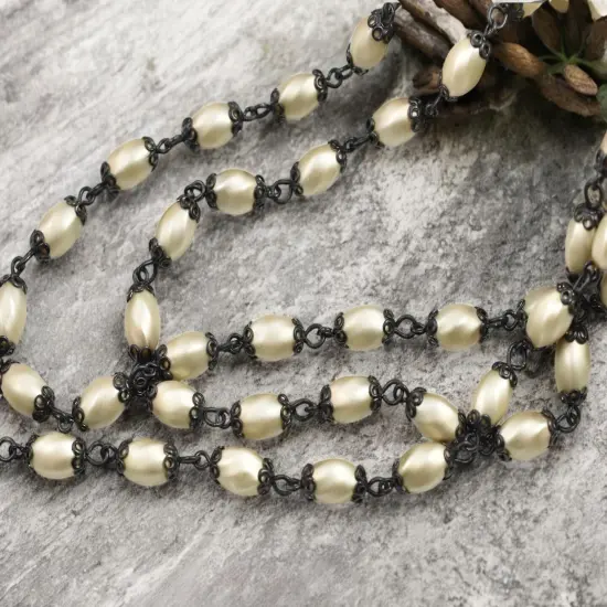 10x6mm Czech Glass Cream Twisted Oval Pearl Chain w/ Black Caps {1}