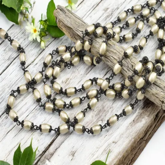 10x6mm Czech Glass Cream Twisted Oval Pearl Chain w/ Black Caps {2}