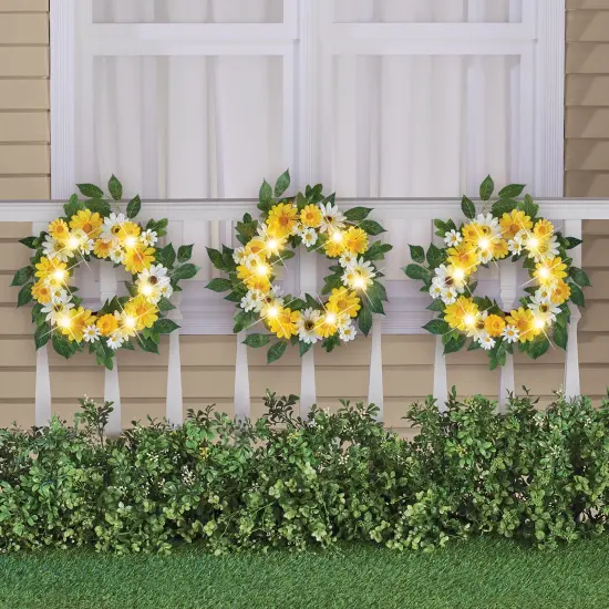 Collections Etc LED Lighted Solar Powered Artificial Daisy Wreaths - Set of 3 {1}