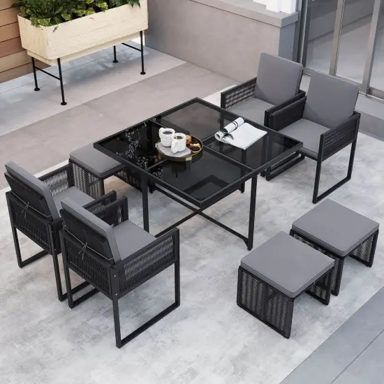 Costway 9 PCS Patio Dining Set with PE Rattan Chairs Tempered Glass Table and Ottomans {4}