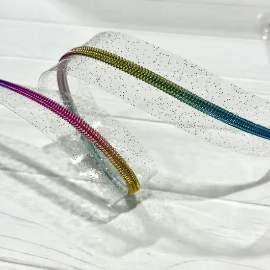 Clear holographic sparkle vinyl zipper tape with rainbow teeth {1}