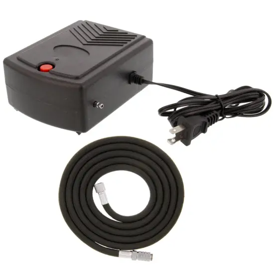 Model TC-22 Mini 12V DC Airbrush Compressor with direct plug in 110V AC Adapter {1}