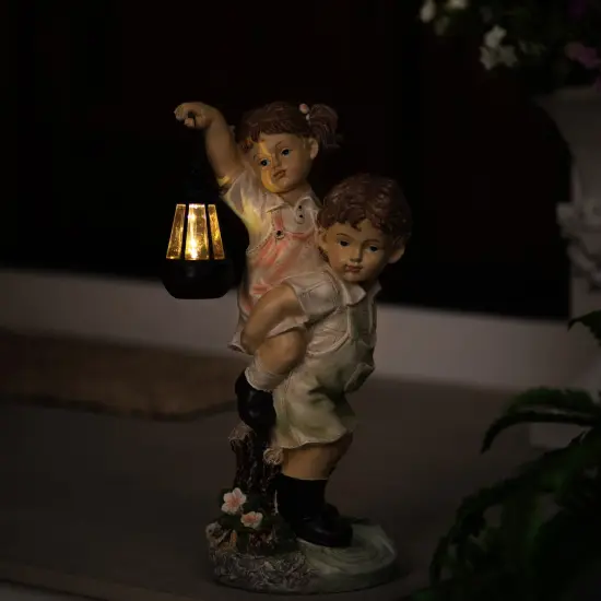 Northlight LED Solar Lighted Boy and Girl with Lantern Outdoor Garden Statue - 19.5" Multi {5}