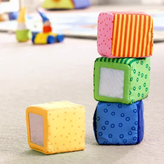 HABA Soft Blocks for Babies 6-12 Months, Happy Quartett Sensory Toy Features a Unique Sound & Texture in All 4 Baby Blocks Multicolor {4}