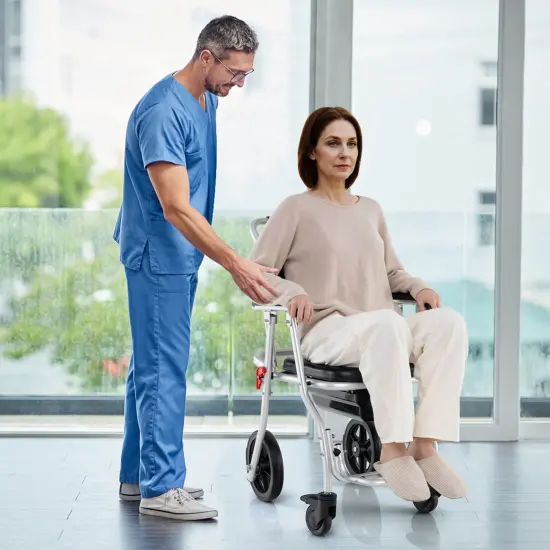 Costway 4-in-1 Bedside Commode Chair with Brakes, Bucket Footrest Padded Seat & Backrest {4}