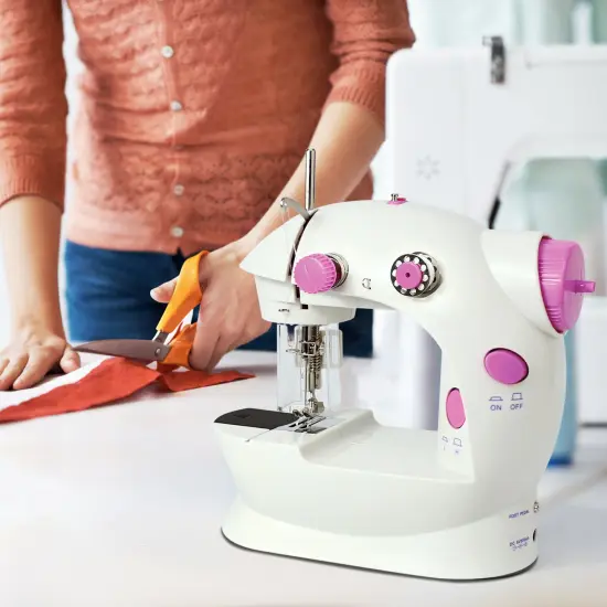 Portable Sewing Machine Adjustable 2-Speed Handheld Electric Crafting Mending Pink {2}