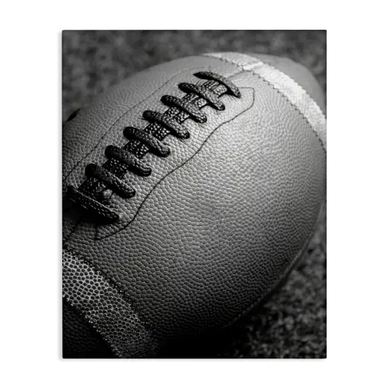 Stupell Industries Close Up Football Canvas Wall Art Design by Daphne Polselli {1}
