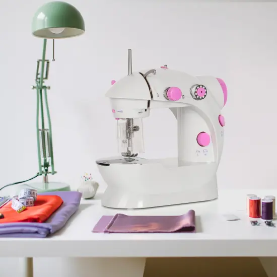 Portable Sewing Machine Adjustable 2-Speed Handheld Electric Crafting Mending Pink {4}