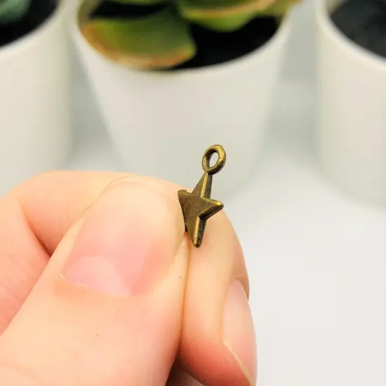 Small Bronze Star Charms, 8x11mm {3}