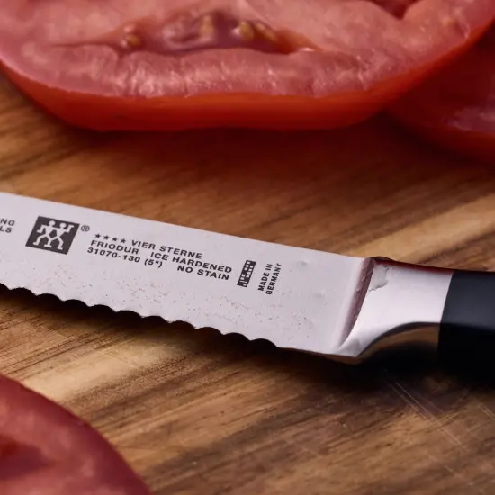 ZWILLING Four Star 5-inch Serrated Utility Knife {5}
