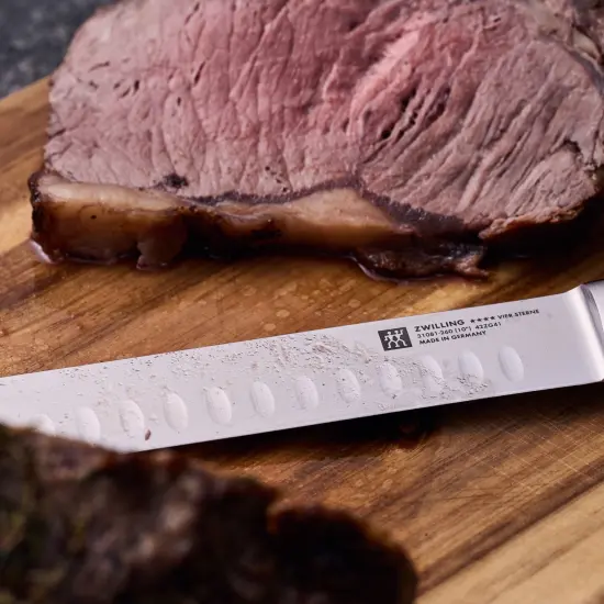 ZWILLING Four Star 10-inch Hollow Edge Slicing Knife {4}