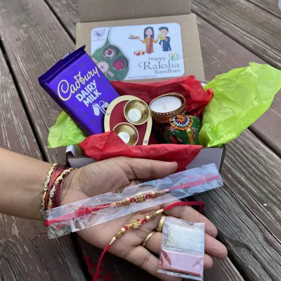 Rakhi Gift Hamper for Brother Bhabhi Raksha Bandhan Set of 2 Ganesha Bracelet Rakhis with Roli Chawal Rakhi Stickers Gift Box Bhaiya Sister In Law Traditional Rakhi Combo {3}