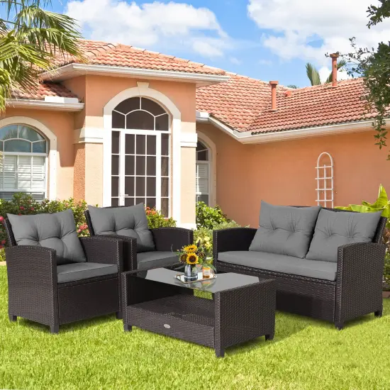 Costway 4 PCS Patio Rattan Furniture Set Glass Table Shelf Sofa Cushion Gray {4}