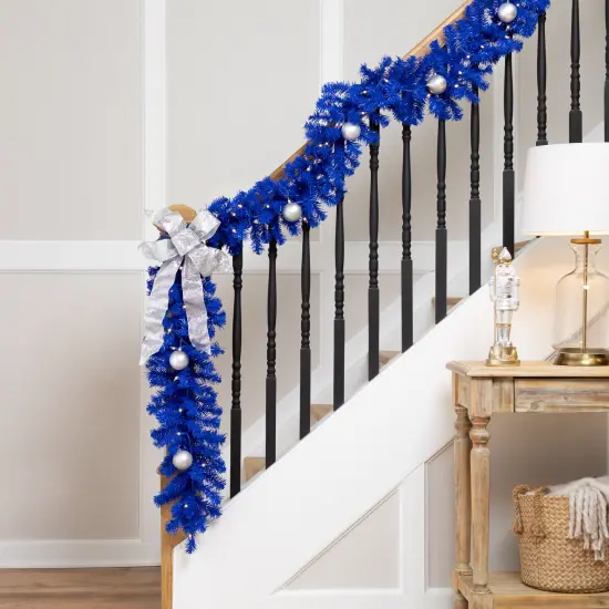 Northlight Pre-Lit Artificial Pine Christmas Garland - 9' - Royal Blue - Clear Lights {1}