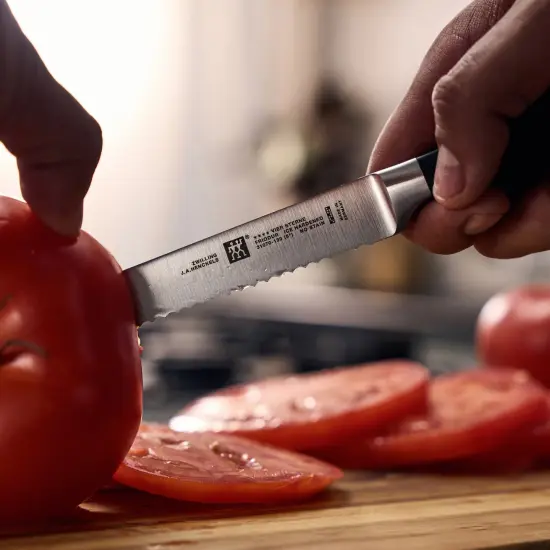ZWILLING Four Star 5-inch Serrated Utility Knife {4}