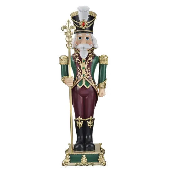Haute Decor 35 inch Tall Solid Resin Decorative Holiday Nutcracker with Fleur de Lis {1}