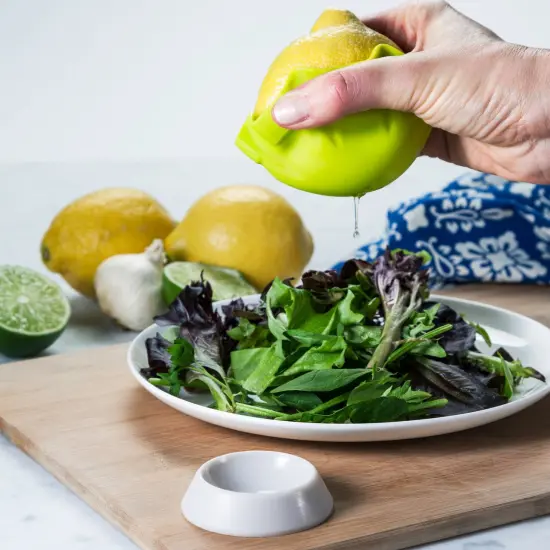 Hutzler Lemon / Lime Citrus Squeezer with Stand, Silicone Hand Juicer- Easy Mess-Free Squeezing for Table Serving Yellow {5}