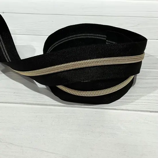 Light Gold teeth on Black zipper tape {1}