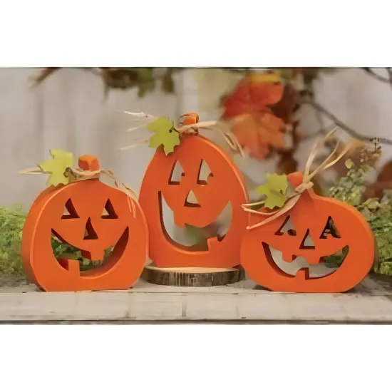 Orange Wooden Pumpkin Sitters Set of 3 with Carved Faces, Raffia, and Leaf Accents {2}