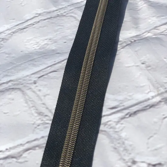 Black with Antique Bronze zipper tape {1}