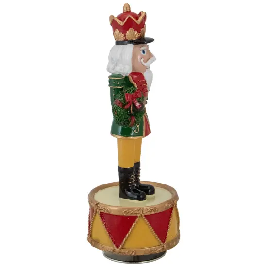 Northlight Musical Revolving Christmas Nutcracker Figure - 8.25" Green {4}