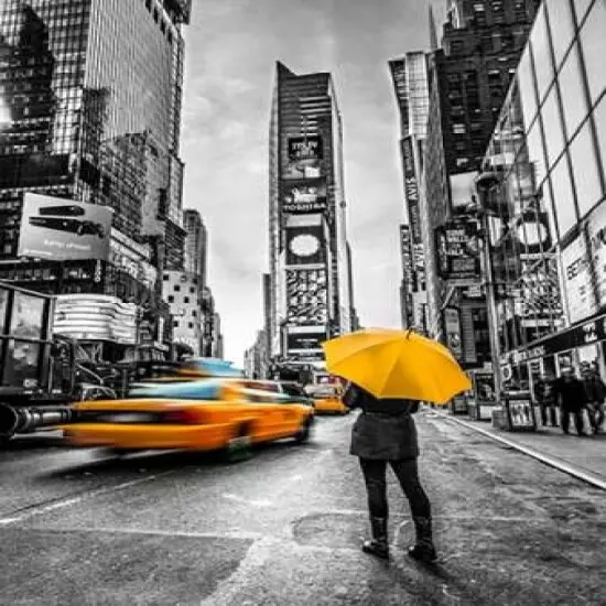 Man with yellow umbrella at Times square, New York Poster Print byAssaf Frank - Item # VARPDXAF20131115106PC02 {1}