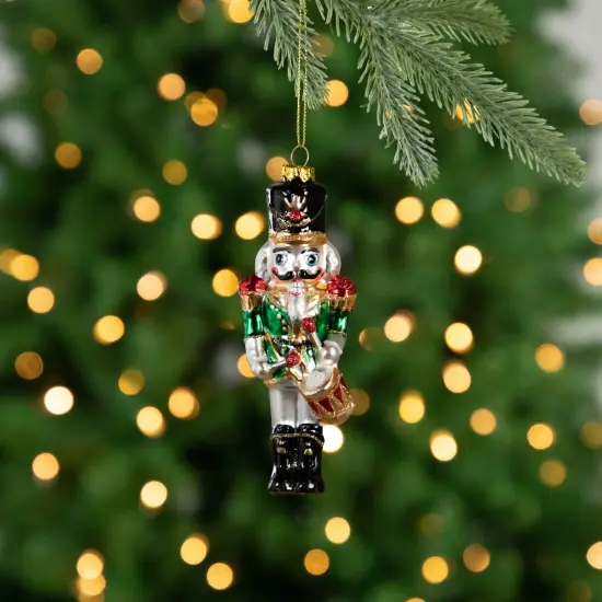 Northlight 5.25" Green, Red and Gold Nutcracker With Drum Glass Christmas Ornament White {3}