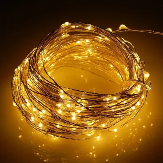 Perfect Holiday 100 LED Silver Copper Fairy Light Plug in Yellow {1}