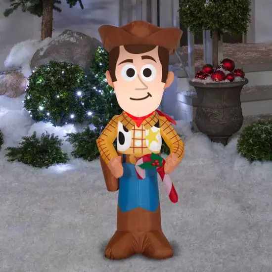 3.5ft. Airblown&reg; Inflatable Stylized Woody with Candy Cane {3}