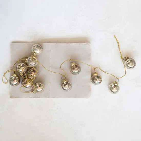 Hello Honey® 6ft. Antique Gold Etched Mercury Glass Ball Ornament Garland with Snowflakes {3}