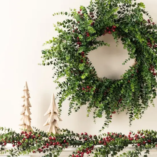 Glitzhome&reg; 28"D Christmas Greenery PE Eucalyptus Wreath with Red Berries {4}
