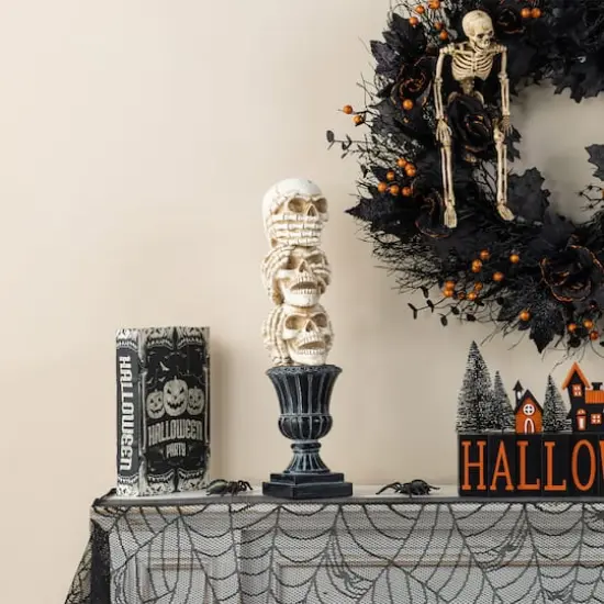 Glitzhome&reg; 18"H Halloween Resin Stacked Skull Table Decor {5}