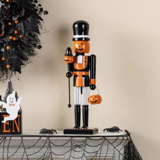 Glitzhome&reg; 18.5"H Halloween Wooden Pumpkin Nutcracker with Ghost Ornament {4}