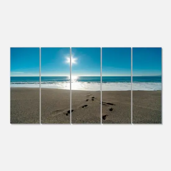 Designart - Blue Sea and Footprints in Sand - Large Seascape Art Canvas Print {1}