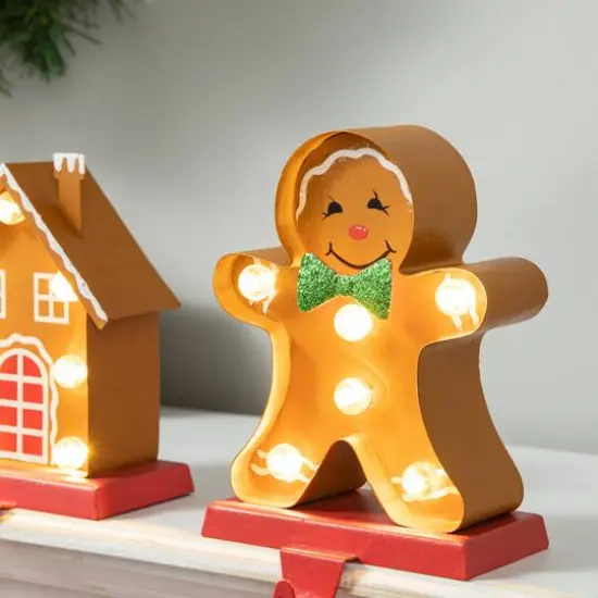 Glitzhome&reg; Marquee LED Gingerbread House & Gingerbread Man Christmas Stocking Holder Set {6}