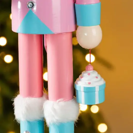 Glitzhome&reg; 24"H Wooden Christmas Pink Cake Nutcracker {6}