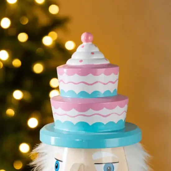 Glitzhome&reg; 24"H Wooden Christmas Pink Cake Nutcracker {4}