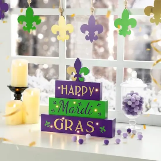 Glitzhome® 11.75" Lighted Mardi Gras Wooden Fleur-de-Lis Block Table Sign {4}