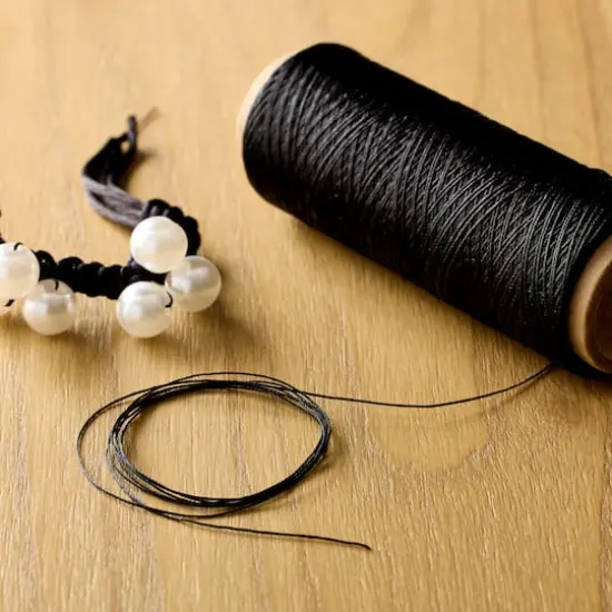 Gudebrod 0.015" Waxed Polyester Thread Black {3}