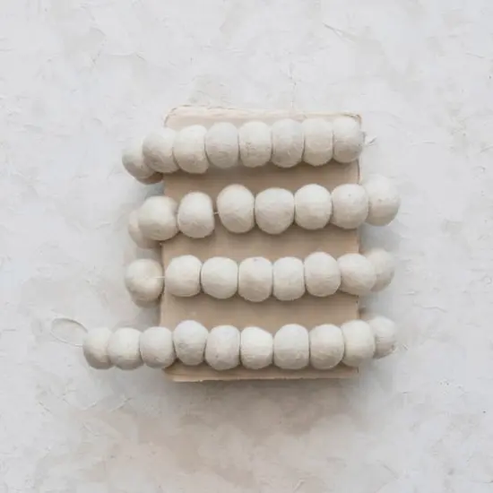Hello Honey&reg; 6ft. Cream Handmade Wool Felt Ball Garland {3}