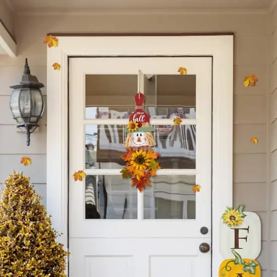 Glitzhome&reg; 26" Fall Wood Scarecrow Floral Door Hanger {7}