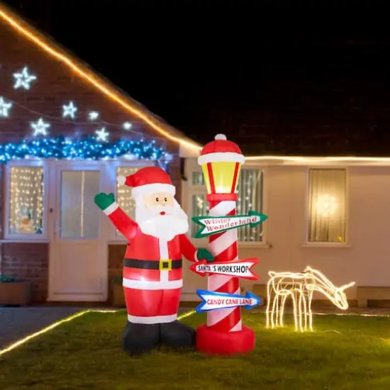 Glitzhome&reg; 7FT Lighted Inflatable Santa with Lamp Post Sign Decor {3}