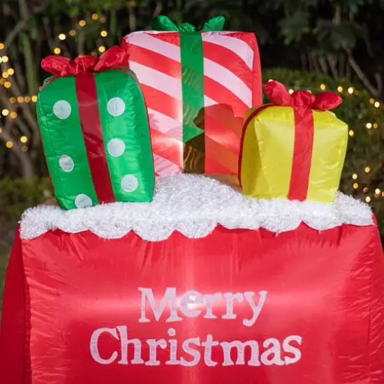 Glitzhome® 8ft. Lighted Inflatable Santa On Pick-Up Train Décor {6}