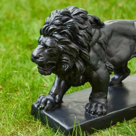 Glitzhome&reg; 24.5" Walking Lion Garden Statue {7}