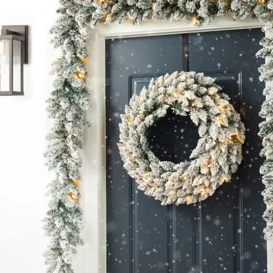 Glitzhome&reg; 6ft. Pre-Lit Snow Flocked Christmas Garland, 2ct. {5}
