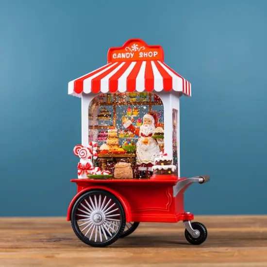 10.75" LED Snow Globe Santa's Candy Stand {3}