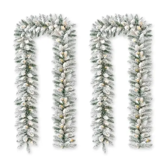 Glitzhome&reg; 6ft. Pre-Lit Snow Flocked Christmas Garland, 2ct. {1}