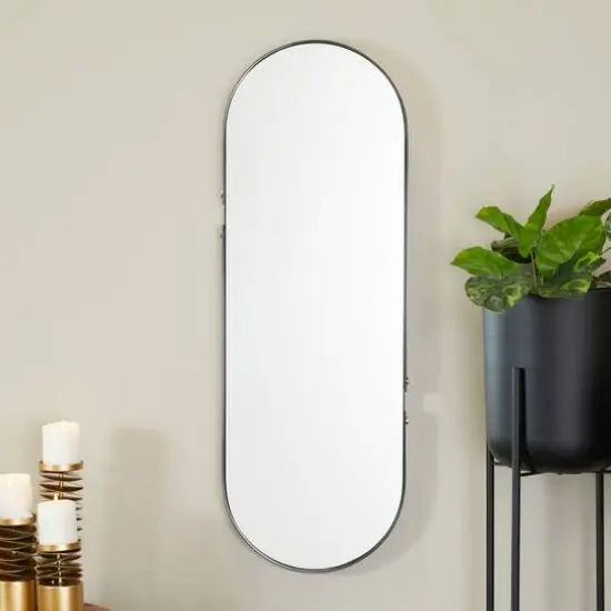 CosmoLiving by Cosmopolitan Black Metal Oval Wall Mirror 15" x 2" x 43" {7}
